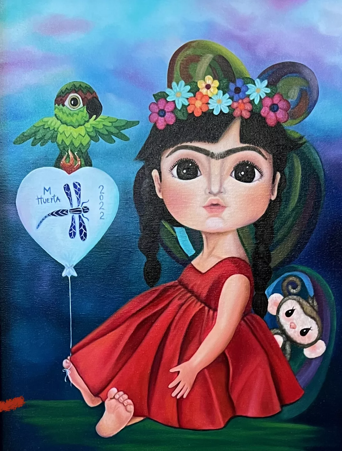 Maru Huerta Pies, Para Que Los Quiero, Si Tengo Alas Para Volar (Why Would I Want Feet When I Have Wings To Fly), 2022  Oils on canvas. 14”x20”  The artist describes the piece as representing a woman’s pride and love for her family. On an ombre blue sky with soft pink clouds sits a barefoot and wide eyed girl with a unibrow. She wears a red dress, a crown of flowers, and her hair hanging in two braids. A small monkey peeks from behind her. A green bird flutters its wings while standing on a heart shaped bal