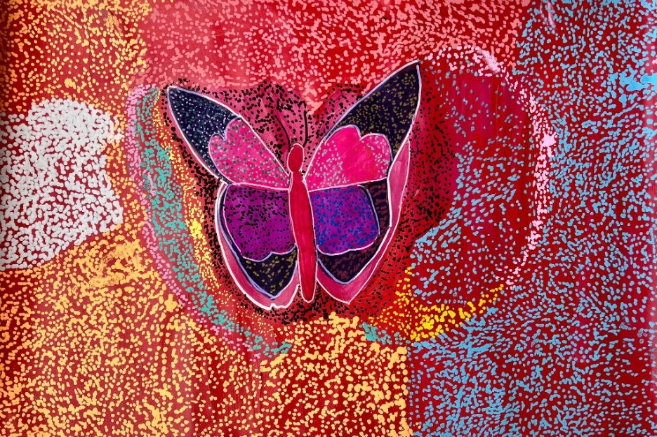 A pink and purple butterfly with black accents floats in the center of the page, with spread wings, impacting the surrounding areas. These areas, red and covered with dots of white, yellow, green, blue, and pink, are so variously and densely filled with dots that they seem to create granular shapes. The butterfly, lined in white, is both embedded in these surrounding areas while standing apart from them.